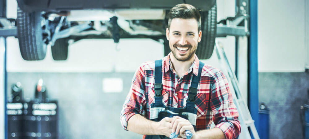 auto mechanic smiling