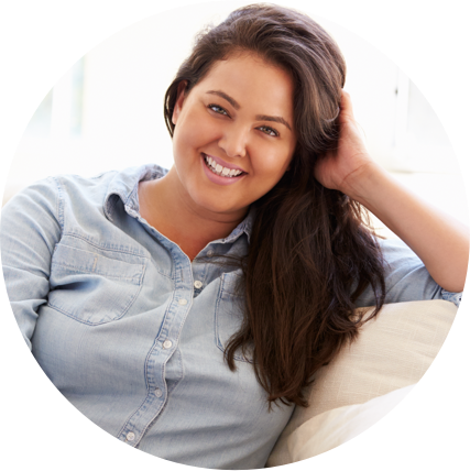 photo of a woman sitting on couch