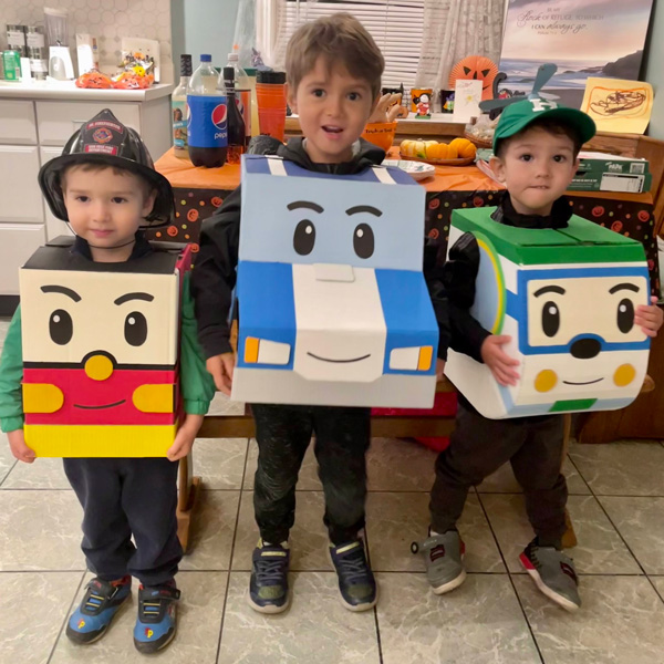 my boys dressed as characters from Robocar Poli